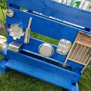 Volunteer-made sensory board outside at the CSC playground.